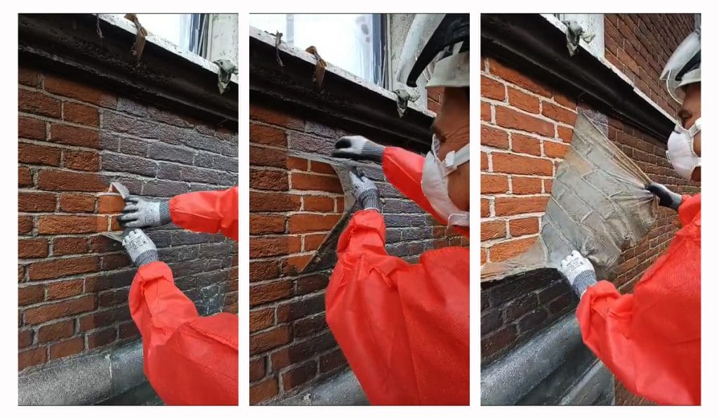 Il Soot Removal Film viene rimosso da un muro