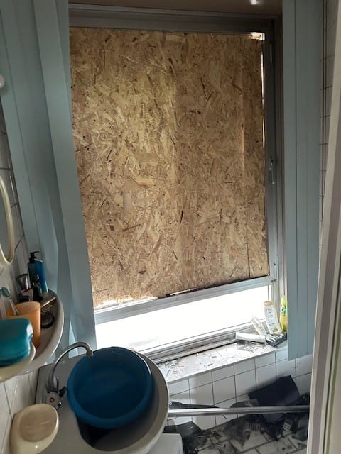 Foto van een flat na een brand