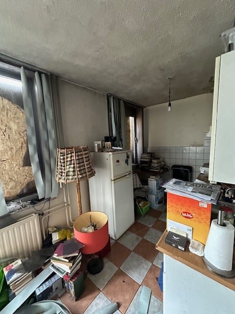 Foto van een flat na een brand