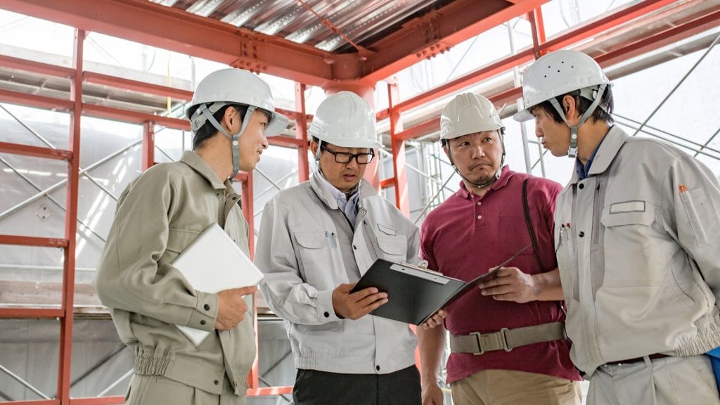 A group of insurance agents brokers discussing about a project