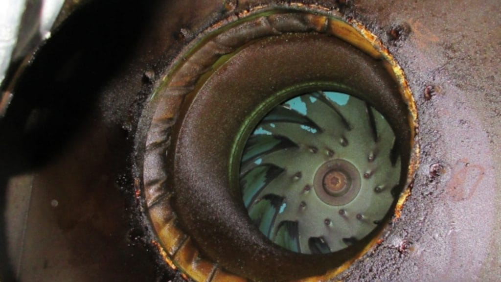 Close-up of an propeller, focusing on the blades and engine connection.