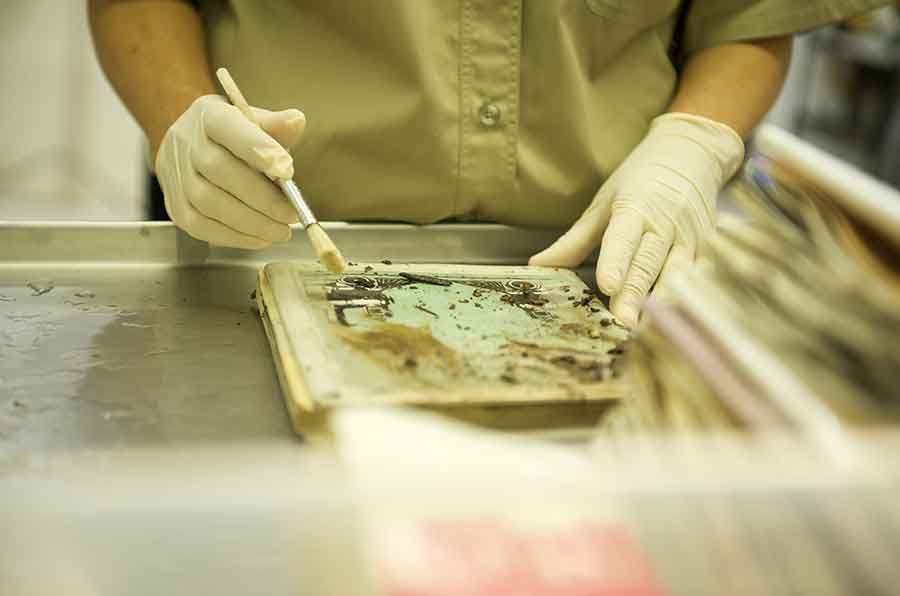 BELFOR document technicians washes contaminated photo