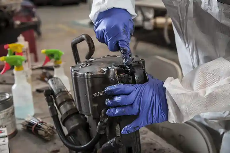 cleaning and decontamination of machinery part