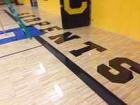 Gymnasium floor water damage after restoration