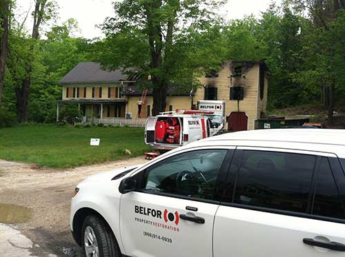 BELFOR vehicles at residential fire
