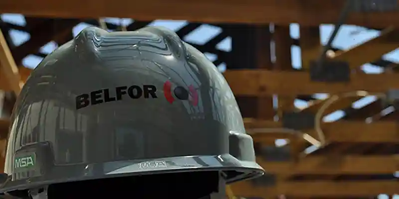 BELFOR hard hat on construction job