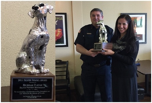 BELFOR Reno’s Michelle Turner receives the  Silver Sparky Award from Fire Prevention Association of Nevada