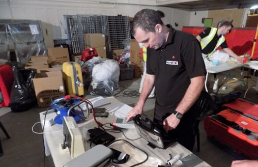 Damage assessment by BELFOR Technicians in the Processing Hub